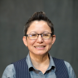 Headshot of Rita E. Urquijo-Ruiz