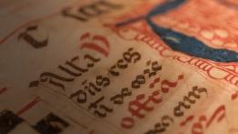 Close up on text inside a latin book. 