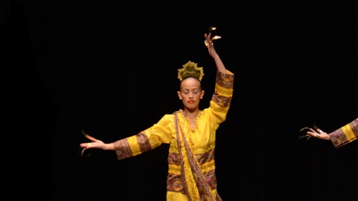 Dancer performing on a stage in a show