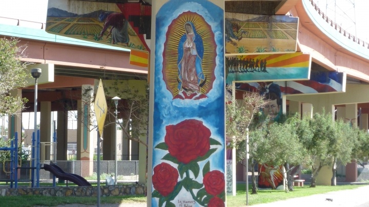 art adorns the side of a highway overpass