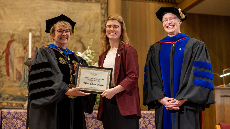 Claire Siewert receives their award from President Beasley and Provost Mustain.