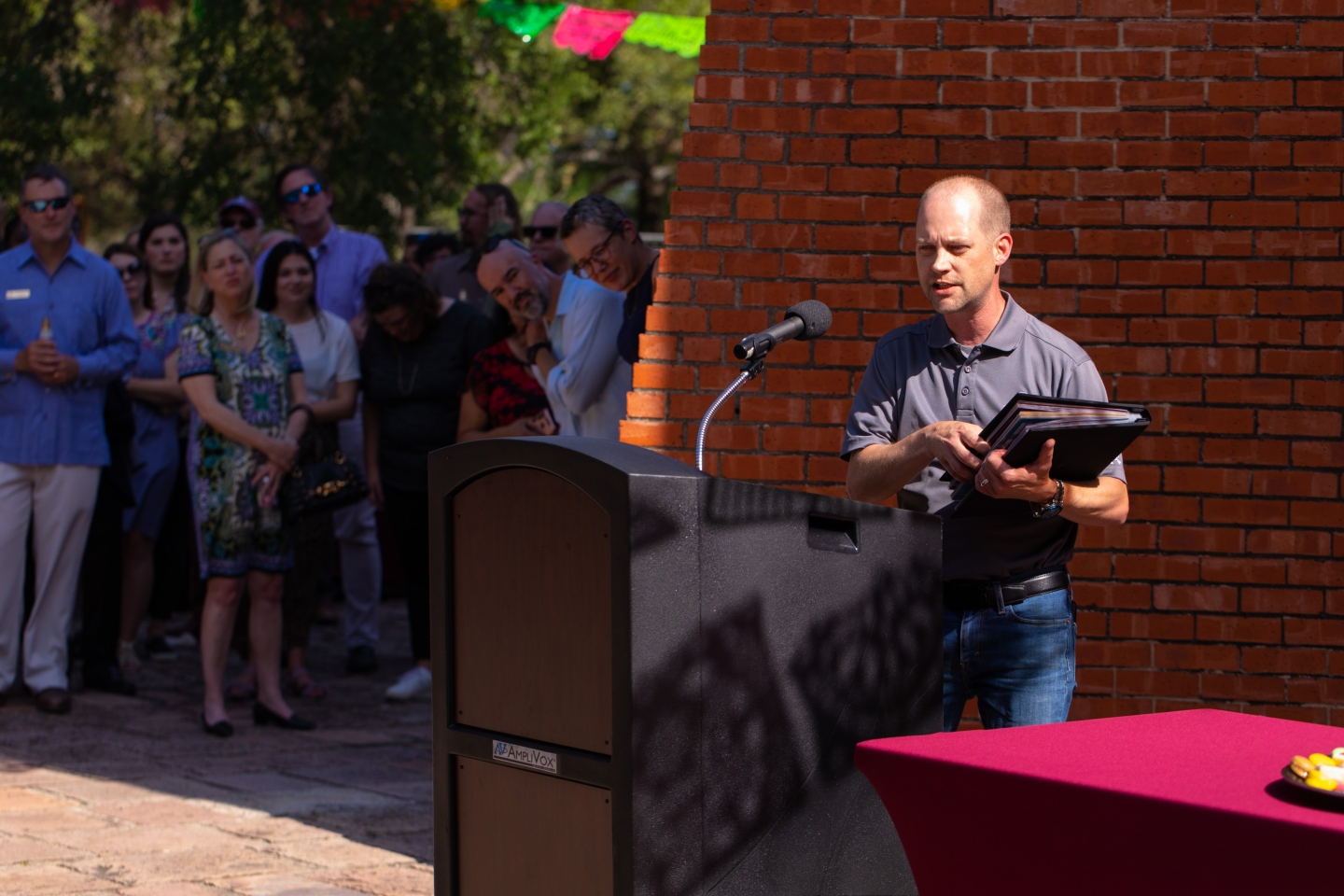 Trey Dunn speaking at ceremony