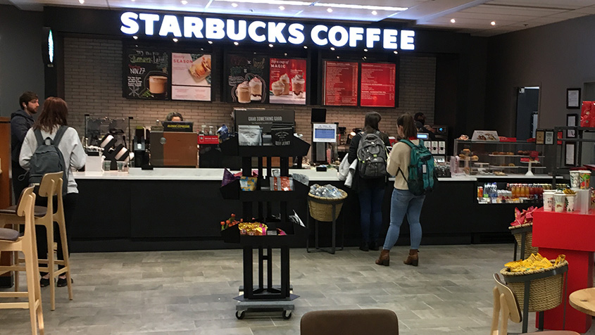 Students in waiting in line at Starbucks