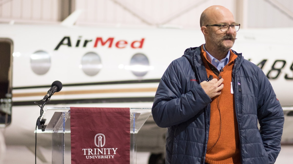 Les Bleamaster gives a lecture in front of an AirMed plane
