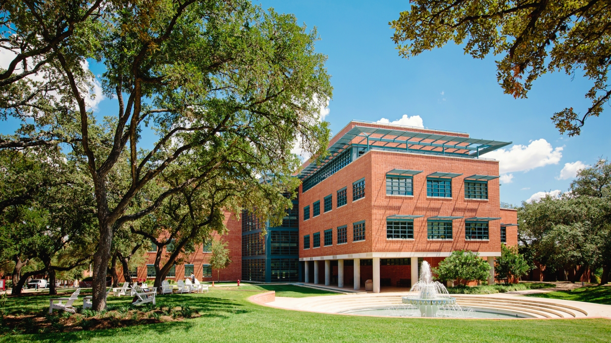 back of northrup hall with miller fountain