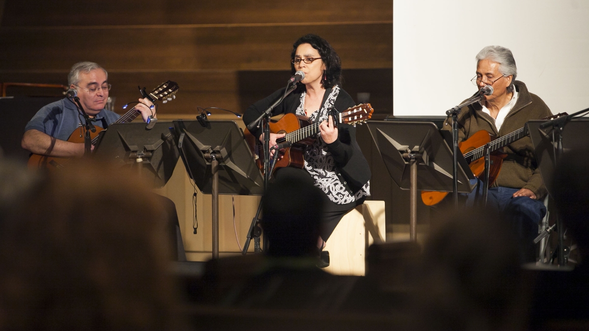 three musicians play string instruments in Parker chapel
