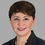 headshot of Adriana Mendez-Rugh